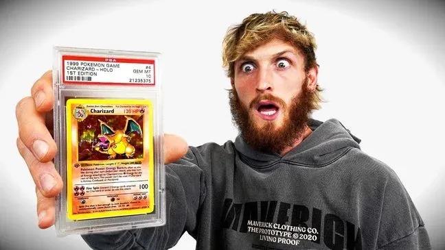Logan Paul holding 1st edition gem mint Charizard Pokemon card